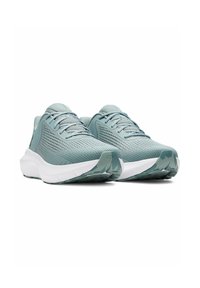 Lichtblauwe sportschoenen met een bovenwerk van mesh, een gestructureerd ontwerp en een witte gevoerde zool. Beschikt over een vetersysteem en een rubberen traction buitenzool.