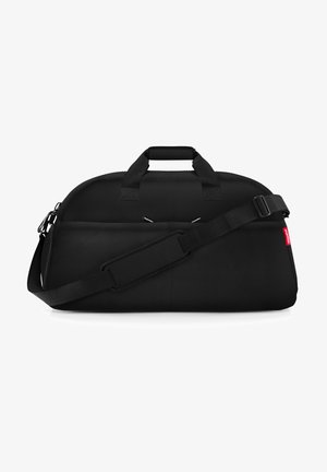 Sac de sport noir en tissu durable, avec deux poignées supérieures, une bandoulière réglable et une fermeture zippée. Texture lisse.