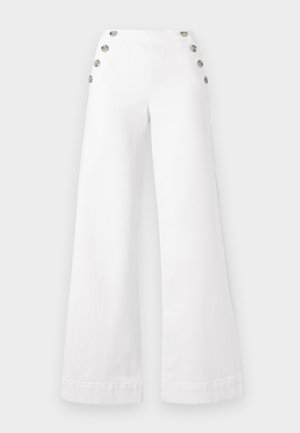 White wide-leg pants made of cotton, featuring large decorative buttons on the sides, with a smooth texture and clean seams.