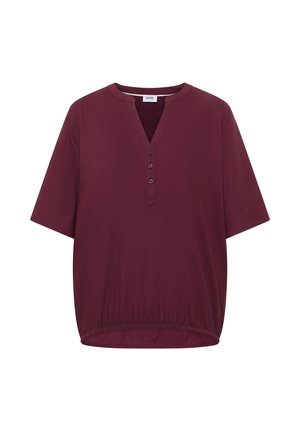 Kortærmet, mørk vinrød bluse med rund halsudskæring, tre knapper foran og elastisk kant.