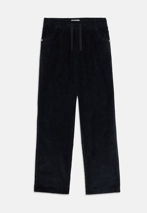 Svart kordfløyels buks med vid benvidde, elastisk midje med snor, frontlommer og detaljer med sølv nagler.