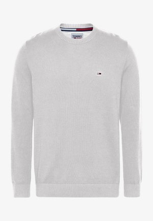 Pull blanc en maille à col rond avec manches longues et petit logo Tommy Hilfiger sur la poitrine gauche.