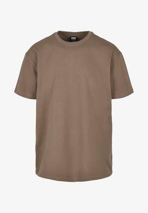 Hnedé tričko z bavlny, s okrúhlym výstrihom, krátkymi rukávmi a voľným strihom s hladkou textúrou. Bez vzorov a akcentov.