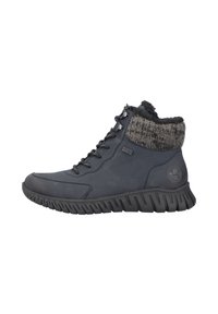 Bottines bleu marine avec un col en tricot textur�é, ornées de lacets noirs et d'une semelle en caoutchouc robuste avec des motifs de crampons prononcés.