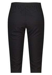 Zwarte, middelhoge broek met een elastische tailleband, voorzien van twee achterzakken en een gladde, matte textuur. Geen zichtbare hardware of patronen.