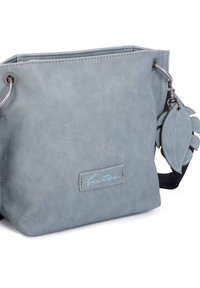 Szara torba z sztucznej skóry o prostokątnym kształcie, z przeszyciem, srebrnymi elementami i niebieskim akcentem w kształcie liścia. Widoczna etykieta marki.