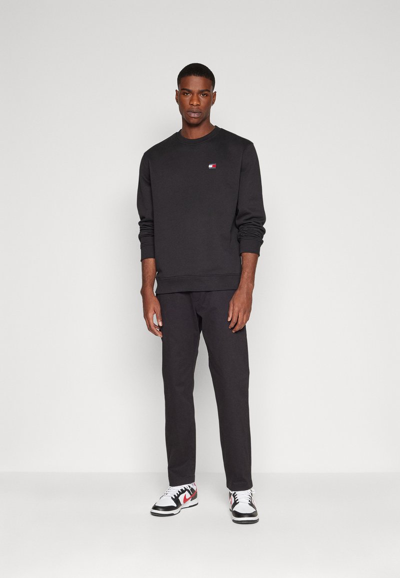 Pantalone Tommy Jeans in felpa 