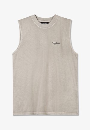 Ujjatlan bézs tanktop, puha anyagból készült. Kerek nyakkivágással és fekete hímzett logóval rendelkezik a mellrészen. Egyszerű, minimalista dizájn.