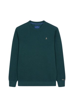 Suéter de punto verde oscuro con cuello redondo, mangas largas y puños acanalados. Presenta un pequeño logo dorado en el pecho.