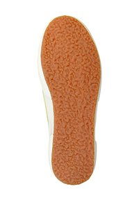 Semelle de chaussure en caoutchouc avec une surface texturée orange et des bords blancs. Présente un motif de petits renflements pour une meilleure adhérence.