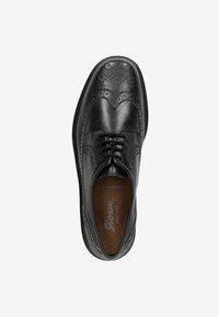 Zwarte leren brogue schoen met decoratieve perforaties, ronde neus en vetersluiting. Heeft een gestructureerde bruine binnenzool.