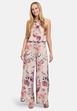 Floral-patterned jumpsuit in light beige with pink and purple accents. Features a loose fit, sleeveless design, and wide-leg trousers.