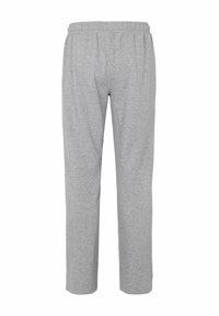 Grå mjukisbyxor i mjukt tyg, med elastisk midja och raka ben, med en enkel design utan synliga mönster eller detaljer.