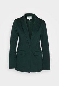 Blazer noir ajusté avec fermeture à un bouton, revers crantés et deux poches avant à rabat, présenté sur un fond blanc.