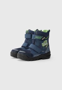 Bottes pour enfants bleu marine avec des accents verts, en tissu texturé, deux bandes velcro et un détail graphique de dragon sur le côté.