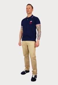 U.S. Polo Assn. Vászonnadrágok - beige