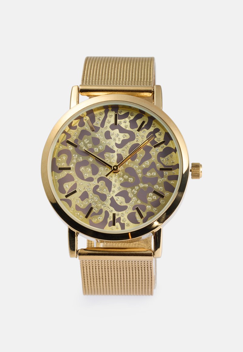 Gold-tone watch with a patterned dial featuring gold and brown accents, a mesh band, and decorative elements like sparkling details.