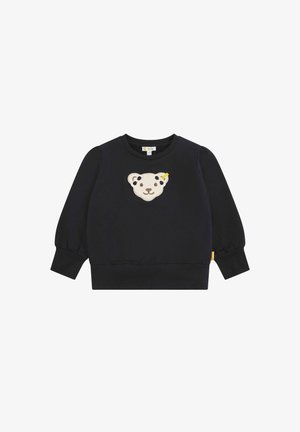 Felpa nera con maniche a sbuffo, caratterizzata da un'applicazione di faccia di orso crema e gialla sul davanti e un'etichetta logo sul lato.