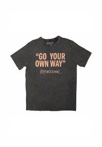 Black cotton t-shirt with short sleeves and round neck. Text on front reads “GO YOUR OWN WAY” in orange, with "FLEETWOOD MAC" below in a stylized font.