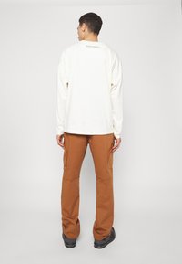 Jordan CHICAGO PANT - Hlačami s stranskimi žepi - british tan