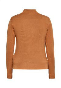 Langarm-Poloshirt aus warmem, intensivem Orange. Gerippte Struktur mit engeren Bündchen und Saum. Einfaches, nahtloses Design.
