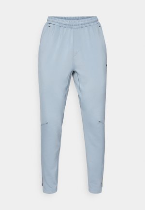 Pantaloni jogger azzurro chiaro con cintura elastica, tasche laterali e gambe affusolate. Realizzati in un materiale morbido e leggero.