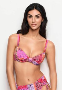 Pink and purple bikini set featuring a paisley pattern, adjustable straps, and a knot detail at the center of the bust. Soft, textured fabric.