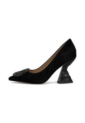 Black suede high-heeled pump with pointed toe and embellished black crystal accents on the upper and uniquely designed, textured block heel.