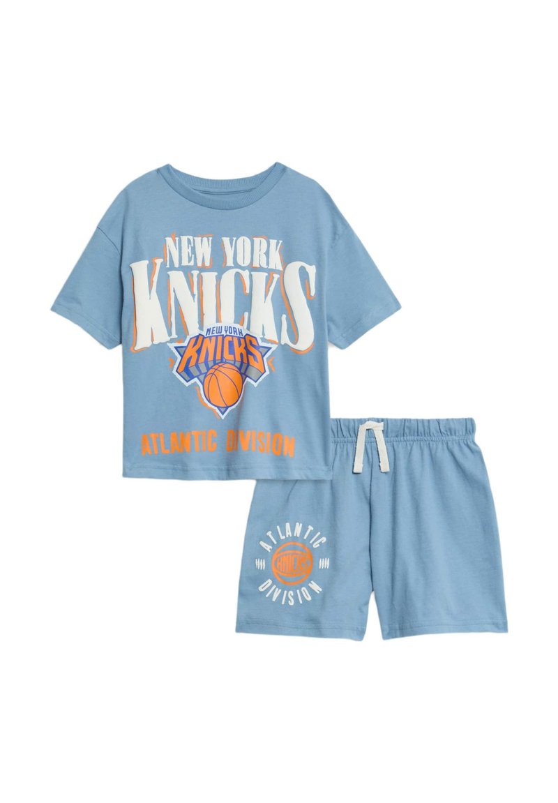 Blue cotton two-piece outfit featuring a short-sleeve T-shirt with "NEW YORK KNICKS" print and matching shorts with an elastic waistband and logo.