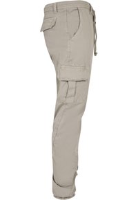 Hellgraue Cargo-Hosen mit schmal zulaufendem Design, elastischen Bündchen, mehreren Taschen und einem Kordelzugbund für eine verstellbare Passform.