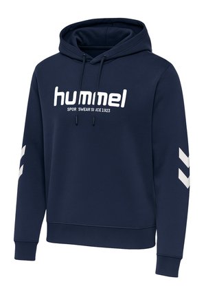 Marineblå hættetrøje lavet af blødt stof med snoretræk i hætten. Har et hvidt logo på brystet og hvide v-formede mønstre på ærmerne.