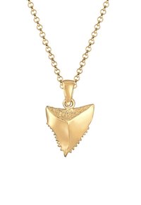 Collana con pendente in oro caratterizzata da un design a forma di dente di squalo triangolare con superficie testurizzata e bordi lisci, sospesa su una delicata catena.