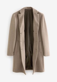 Cappotto in lana beige con colletto a raglan, chiusura doppiopetto e due tasche laterali. Fodera interna in una tonalità più scura con un motivo sottile.