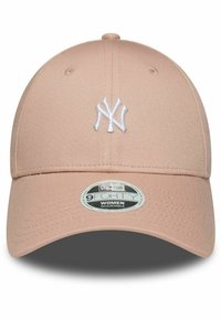 Pink baseball cap made of structured fabric, featuring a white embroidered "NY" logo. Includes an adjustable strap and curved brim.