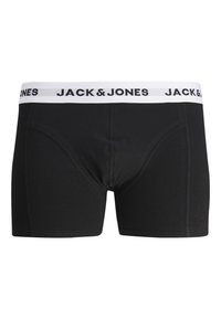 Schwarze Boxershorts mit enger Passform, aus weichem Material. Mit einem weißen Bund, auf dem "JACK & JONES" in Schwarz gedruckt ist.