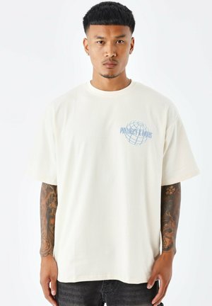 MOTIF PLANÈTE - Camiseta estampada - craie