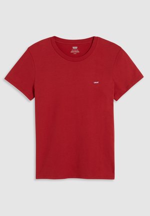 Punainen puuvillapaita, jossa on pyöreä kaula-aukko, lyhyet hihat ja pieni valkoinen Levi's-logo vasemmassa ylärinnassa. Sileä pinta.