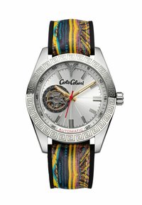 Orologio automatico con cassa in acciaio inossidabile argento, cinturino in pelle colorata con motivo e quadrante argento che mostra il movimento visibile e accentuazioni audaci.
