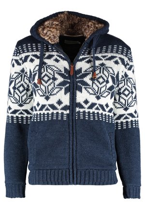 Marinblå zip-up hoodie med vita geometriska mönster, tjock textur, fuskpälsfoder inuti huvan och justerbara dragskor.
