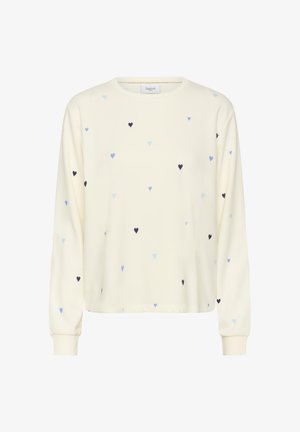 Krém színű hosszú ujjú pulóver szórványosan elhelyezett kék és tengerészkék kis szívmintákkal, bordázott mandzsettákkal és kerek nyakkivágással.