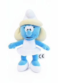Blauw pluche speelgoed met een ronde kop, grote ogen, gele haren onder een witte hoed, en een witte jurk met een gerimpelde onderkant en witte schoenen.