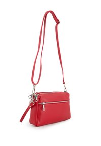 Red leather crossbody bag with a textured finish, two zippered compartments, and a detachable strap. Silver hardware accents.