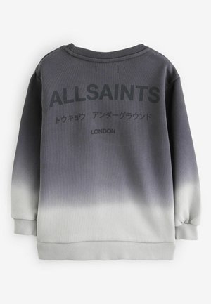 Pelēks krāsu gradients mētelis ar apaļu kaklu, garām piedurknēm un uzrakstu uz muguras: "ALLSAINTS" un "LONDON" melnā krāsā.