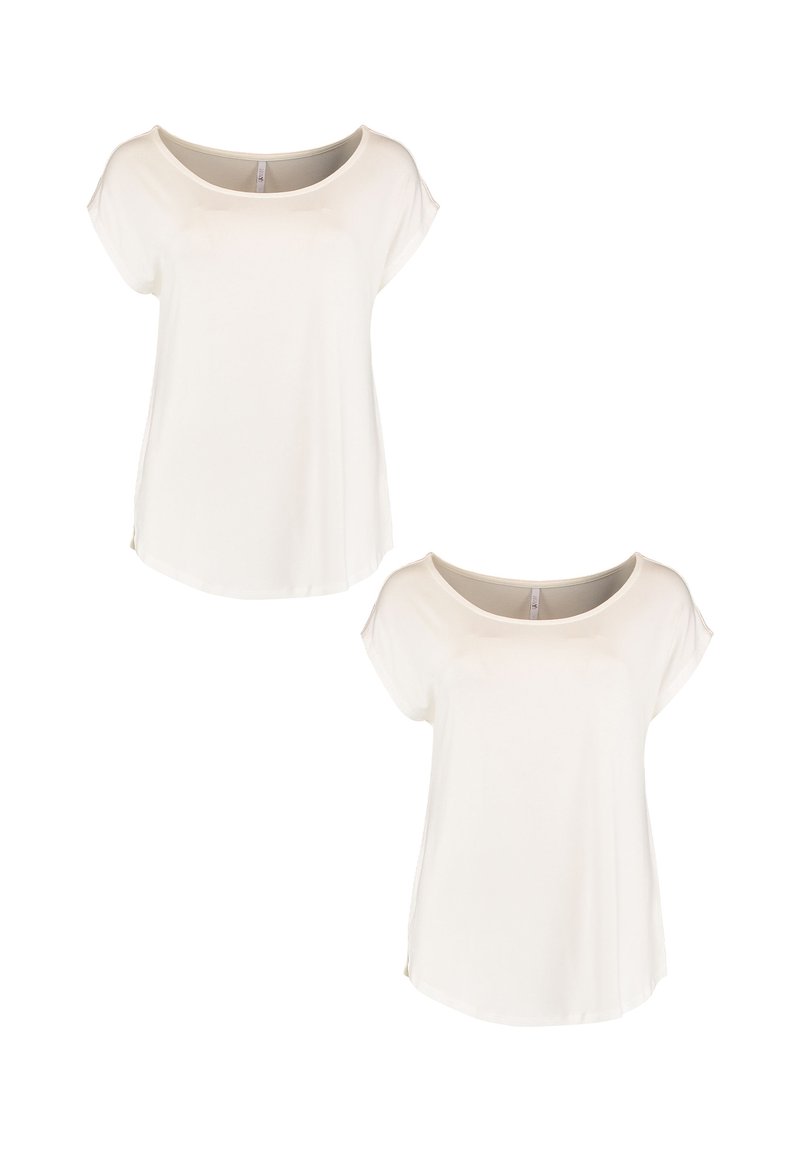 White short-sleeve t-shirts with a wide neck, soft fabric, relaxed fit, and side slits at the hem. Two shirts displayed together.