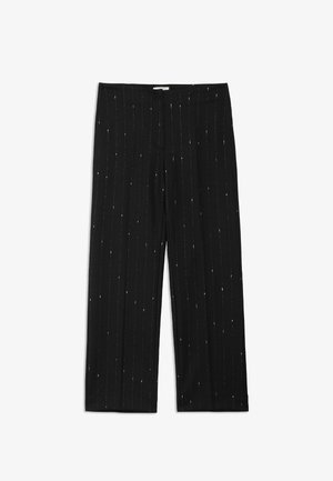 Zwarte wijde broek met verticale metallic streepjes, een soepele textuur en een elastische tailleband voor comfort.