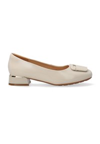 Beige patent leather flat shoe with a rounded toe, mid-heel, and a decorative buckle detail on the front. Smooth texture and minimal design.