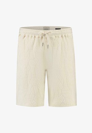 Beige rövidnadrág, texturált geometrikus mintával, rugalmas derékkal és zsinórral, puha anyagból készült.