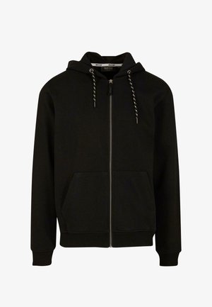 Juodas zip-up džemperis, pagamintas iš medvilnės ir poliesterio mišinio. Savybės: su škotų kapu, dviem priekinių kišenėmis ir elastinėmis rankovėmis bei apačia. Švelni tekstūra.