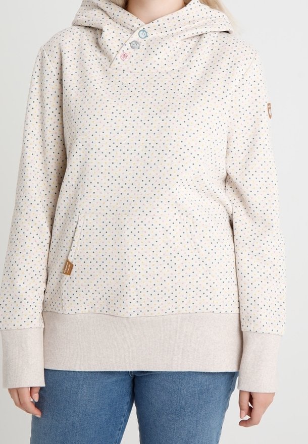 Hoodie beige clair avec des pois multicolores, poche kangourou, poignets côtelés et un détail décoratif en bouton sur le col.