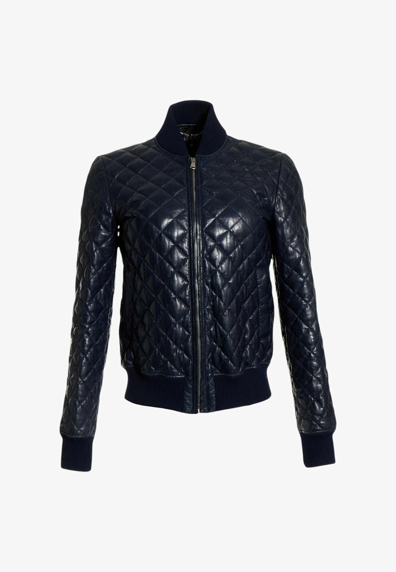 Veste en cuir matelassée bleu marine avec col, poignets et ourlet côtelés, fermeture éclair sur le devant.